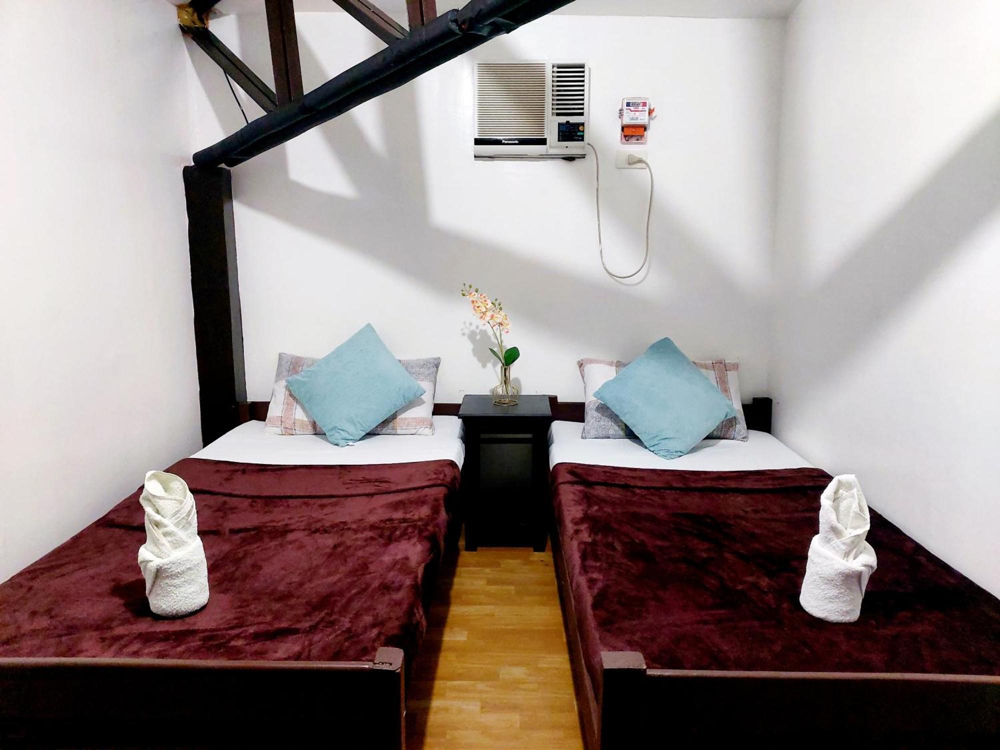 Amancio'S Balai - Near The Airport, City Center! Puerto Princesa Room photo